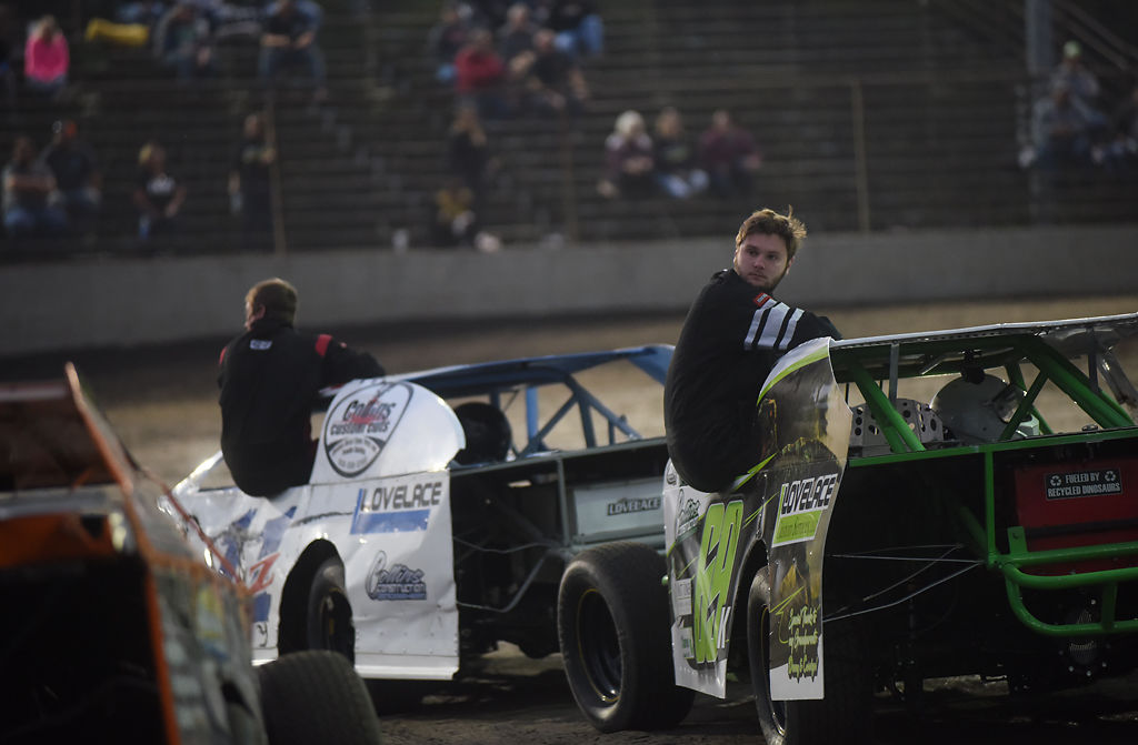 Louie Lovelace watches other B-modified race cars